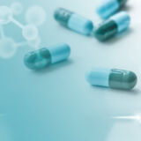 medicine-capsules-global-health-with-geometric-pattern-digital-remix_53876-126742
